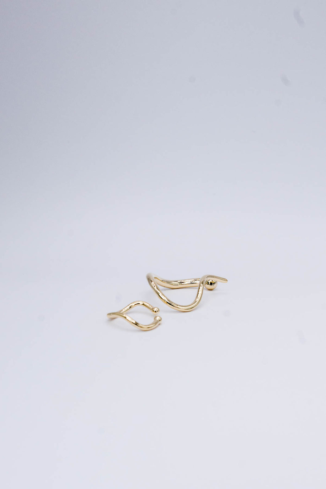 Recipe’s Twisted Ear bone Clip-on Earrings